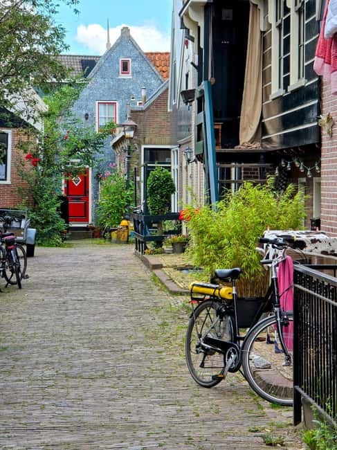 From Amsterdam: Keukenhof Tulips, Windmills & Volendam - What Antonis Covers: Tulips, Windmills, Herring, and Water Shaping Society