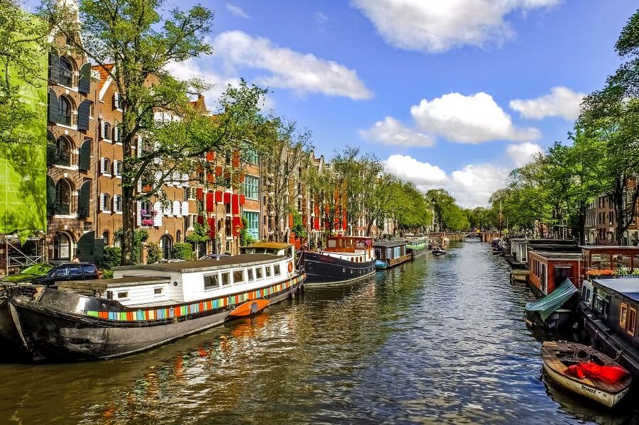 From Brussels: Cheese, Clogs & Windmills Amsterdam Day Trip - Holland by bus: windmills, sand dunes, and those polder views