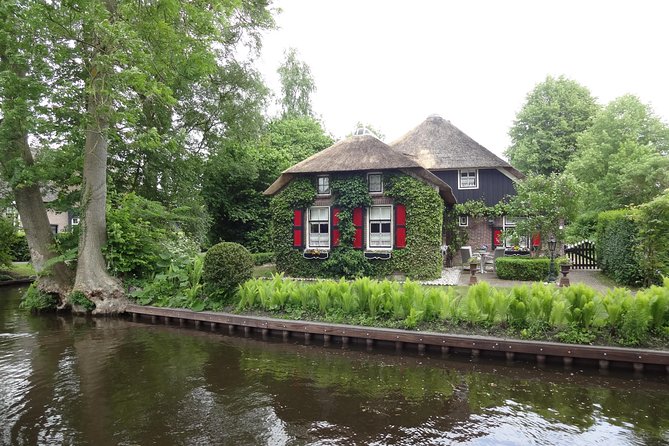 Giethoorn Day Tour from Amsterdam with Small Boat Ride - Zaanse Schans Sometimes Shows Up, and It Can Affect Your Giethoorn Time