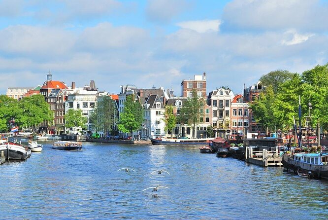 Guided Amsterdam Canal Cruise – Snacks & Drinks on board(1 Hour) - Key Highlights You’ll Actually Care About