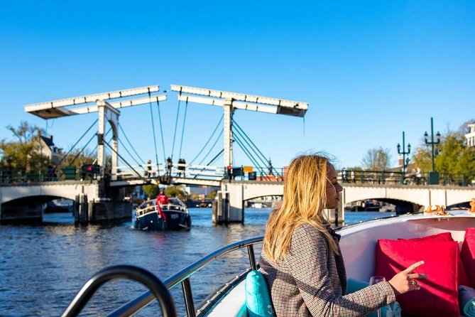 Guided Amsterdam Canal Cruise – Snacks & Drinks on board(1 Hour) - The Route: Stop by Stop From Old Amsterdam to Iconic Bridges