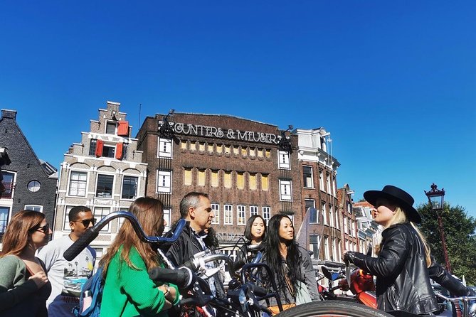 Humans of Amsterdam: Cultural Walking Tour incl. meeting 2 locals - Walking the Canal Ring for about an hour, UNESCO views with human context