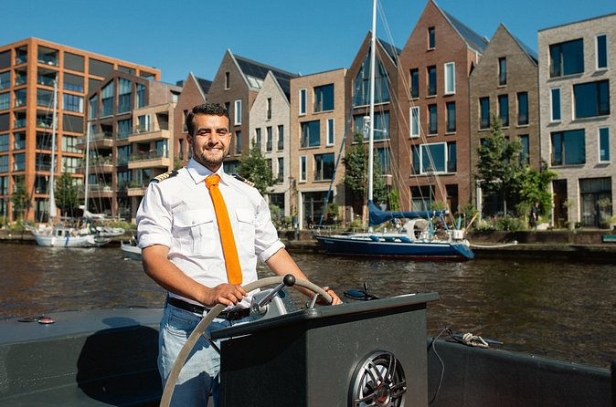 Luxury Shared Canal Tour with live guide - Teylers Museum area, then the windmill story of Molen de Adriaan