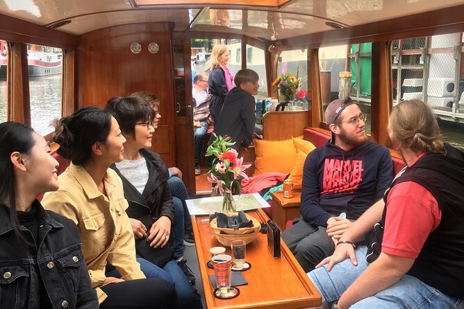 Morning Canal Cruise Amsterdam in Small-Group - Photo Tips When You’re Seated Behind Windows