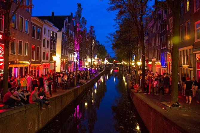 MUST DO: Amsterdam's Red Light District tour with a local - The Dam area and Amsterdam’s wooden-pile foundation story