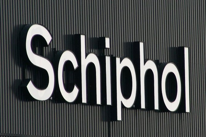 Private Amsterdam Departure Transfer to AMS Schiphol Airport - Hotel reception pickup in Amsterdam, with a driver who stays professional