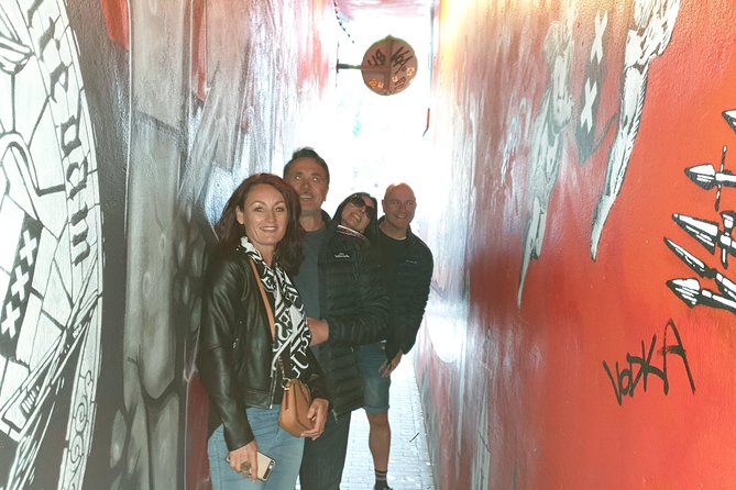 Private Amsterdam Red Light District and Coffee Shop Tour - The Dam Stop: Amsterdam’s Foundation Story, Wooden Poles and All