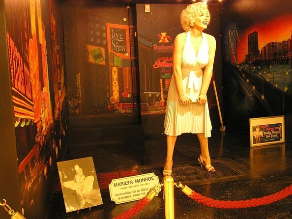 Private Amsterdam Red Light District tour including sex museum - The Old Town Detour: Dam Area, Wooden Foundations, and Surprise Landmarks