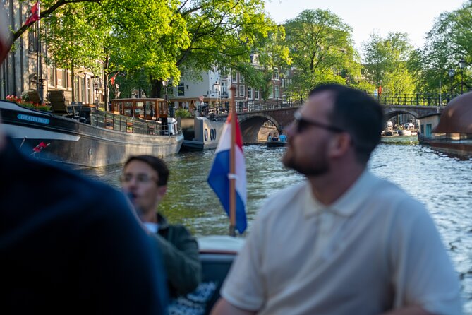 Private Boat Tour Amsterdam - 90 Min incl. welcome drink on historic saloon boat - Weather matters, and you have a safety net