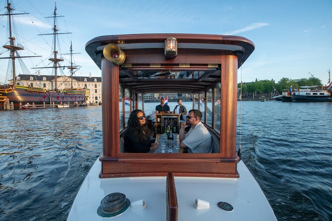 Private Boat Tour Amsterdam - 90 Min incl. welcome drink on historic saloon boat - The guide makes it: Dutch culture, custom pacing, and real hosting