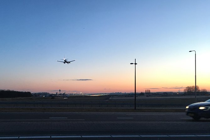 Private departure transfer from Amsterdam to Schiphol Airport (AMS) - Pickup at Your Amsterdam Door, Not the Hassle Zone
