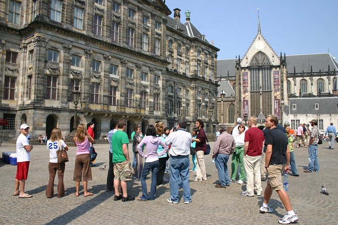 Private Tour: Amsterdam City Walking Tour and Canal Cruise - A 3-hour orientation that starts with a tram and ends on the canals