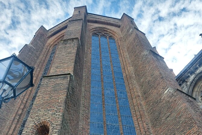 Private Tour of Delft + Visit to Delft Blue Museum & Factory - The Old Church and the skew you will notice immediately