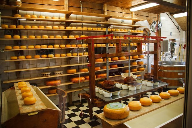 Private Tulip Fields, Windmills and Cheese Tour from Amsterdam - Zaanse Schans: windmills, clogs, and the paint mill you can see inside