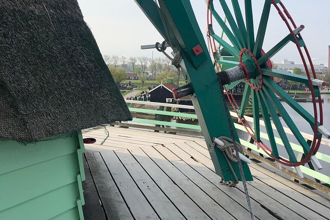 Private Zaanse Schans Windmills and Volendam Tour from Amsterdam - Henri Willig Jersey-cow farm and Gouda tasting: milking robot plus free samples