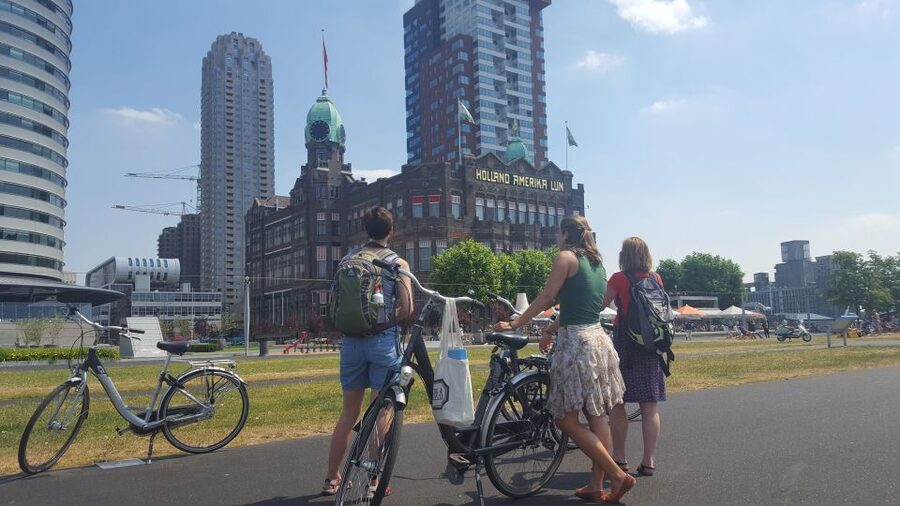 Rotterdam: City Highlights Guided Bike Tour - Martkhal stop: modern Rotterdam starts with a place locals use