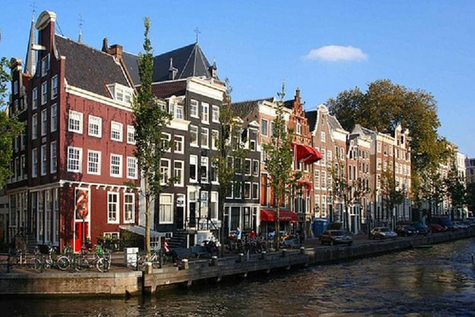 Secrets of Amsterdam Walking Tour plus Dutch Sweets Tasting - Bloemenmarkt floating flower market: the kind of odd detail you remember