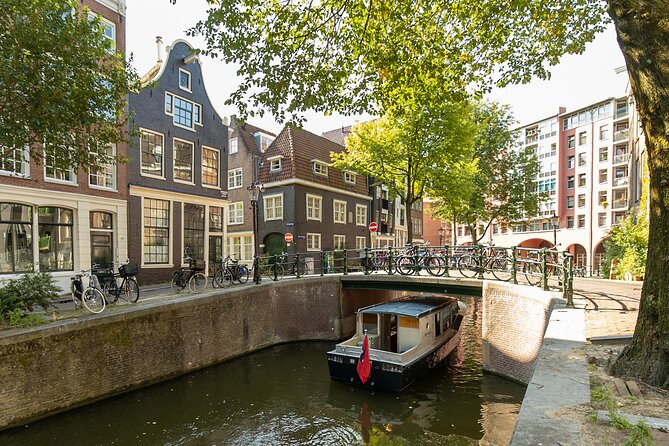 Small Group Boutique All-Inclusive Tour (max 12 p) With Captain - Red Light district practical context, a famous bridge, and the smallest house story