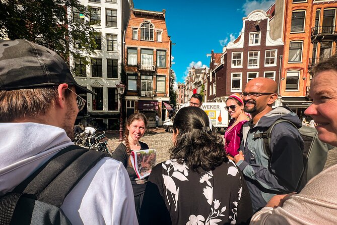 Small Group Walking Tour - Hello Amsterdam - Singel and the Dancing Houses: a canal view that feels like a trick