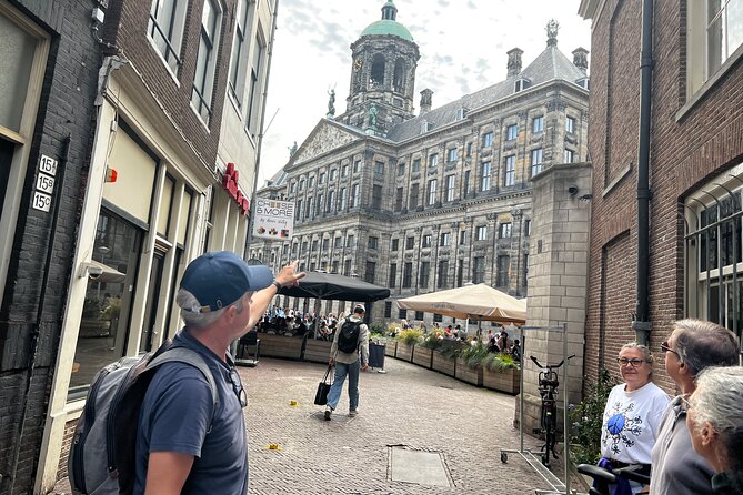 Small Group Walking Tour in Amsterdam with Friendly and Fun Guide - Meet at National MonumentDam, Then Start With Amsterdam’s Biggest Clue