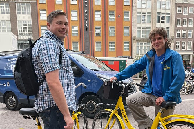 The Original Bike Tour of Amsterdam Highlights and Hidden Streets - Nieuwezijds Kolk Start and the Southern Riverside Warm-Up