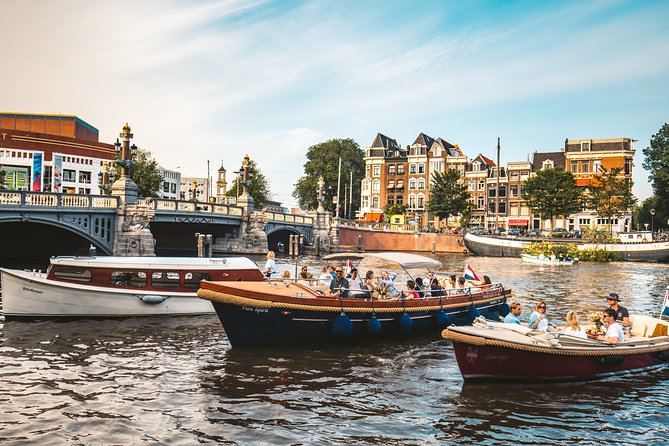 The Ultimate Amsterdam Canal Cruise - 2hr - Small Group with Drinks & Snacks - Rain, glass roofs, and what comfort feels like on this boat