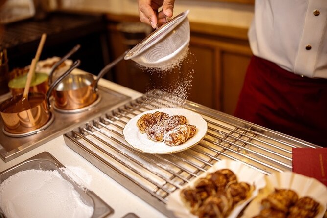 Top 10 Tastes of Amsterdam: Guided Walking Food Tour - Starting in Nieuwendijk with poffertjes, the soft landing