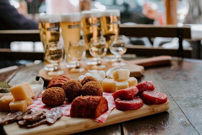Top 10 Tastes of Amsterdam: Guided Walking Food Tour - Haarlemmerdijk classics: raw herring plus battered cod bites