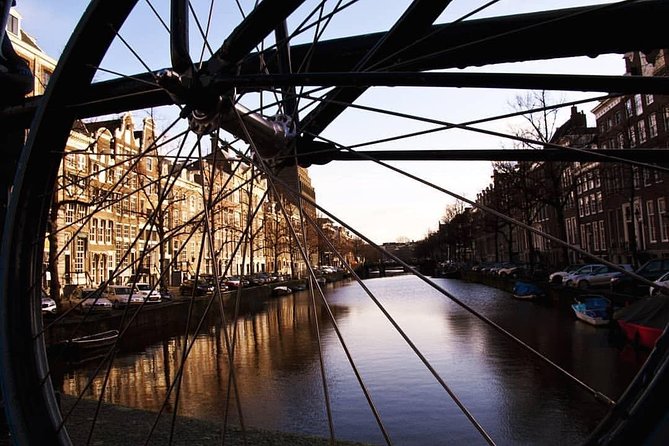 Urban Adventures Amsterdam Bike Tour, Graffiti and Magnet Fishing - Prinseneilandsgracht and the Drawbridge Moment