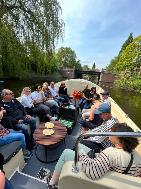 Visit Amsterdam by Boat with a French Guide (french) - 1.5 hours of canals: what you see from the water, in order