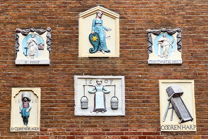 Walking Tour about Golden Age Architecture, private local guide - De Dolphijn: The Dolphin Symbol, Frans Banning Cocq, And Rembrandt’s Night Watch