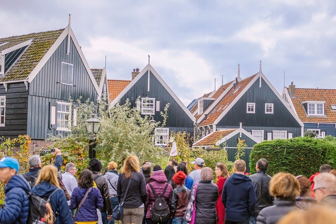 Windmill Tour from Amsterdam, Including Volendam & Marken - Volendam: Fishing-Village Atmosphere Plus a Cheese Stop That May Feel Brief