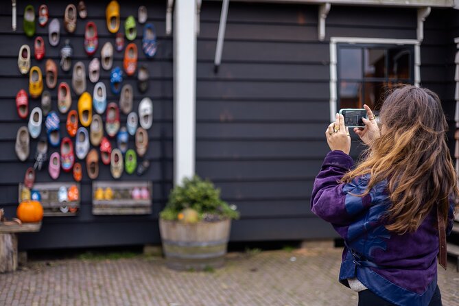 Zaanse Schans Windmills, Cheese and Volendam Tour from Amsterdam - Kooijman Souvenirs and Clogs: the wooden shoe craft moment you remember