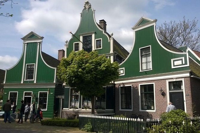Zaanse Schans Windmills, Clogs and Dutch Cheese Small-Group Tour from Amsterdam - Molen De Kat Paint Mill: A Windmill With a Job to Do